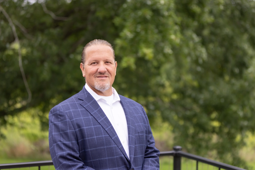 smiling person in professional attire